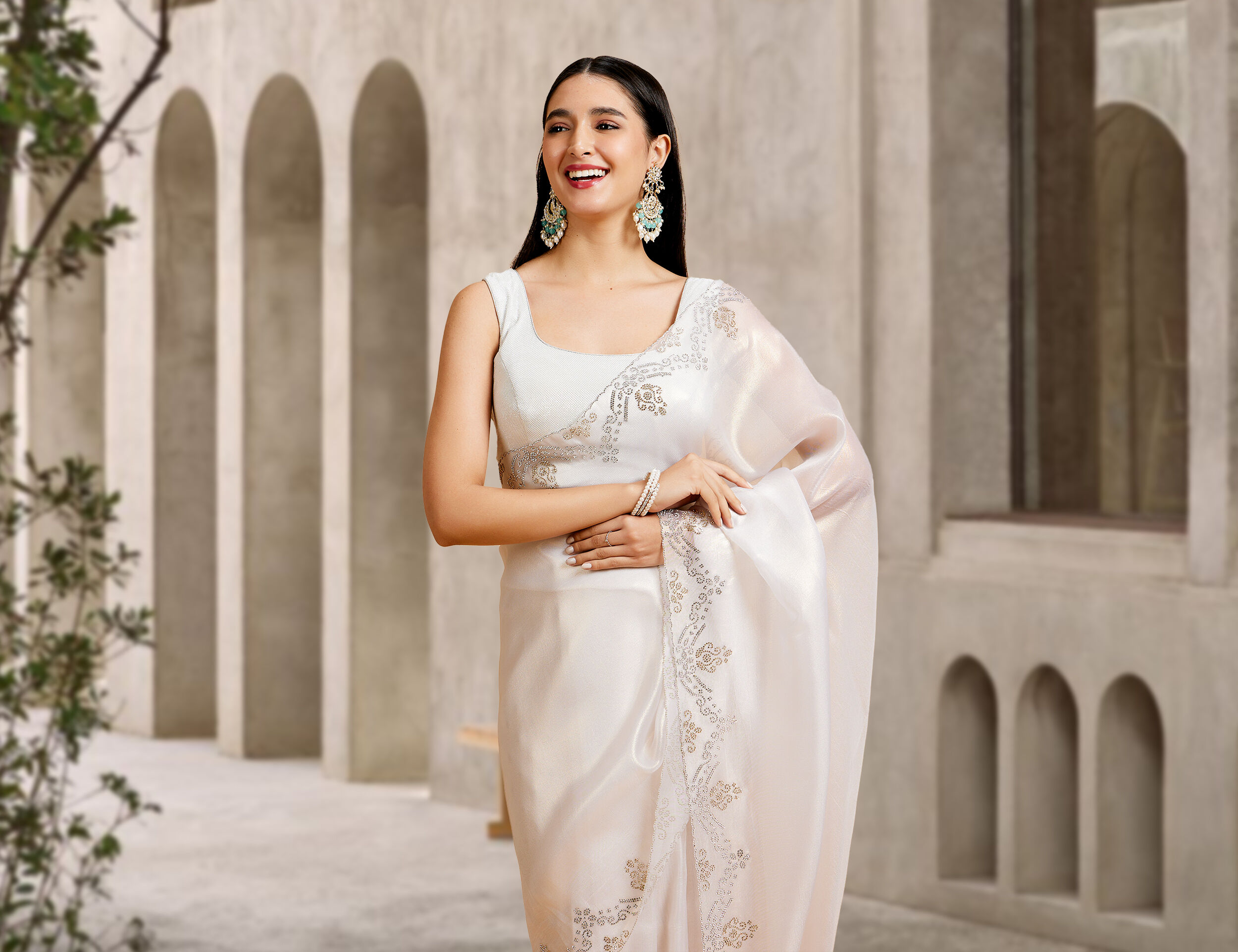 A women in beautifull white saree