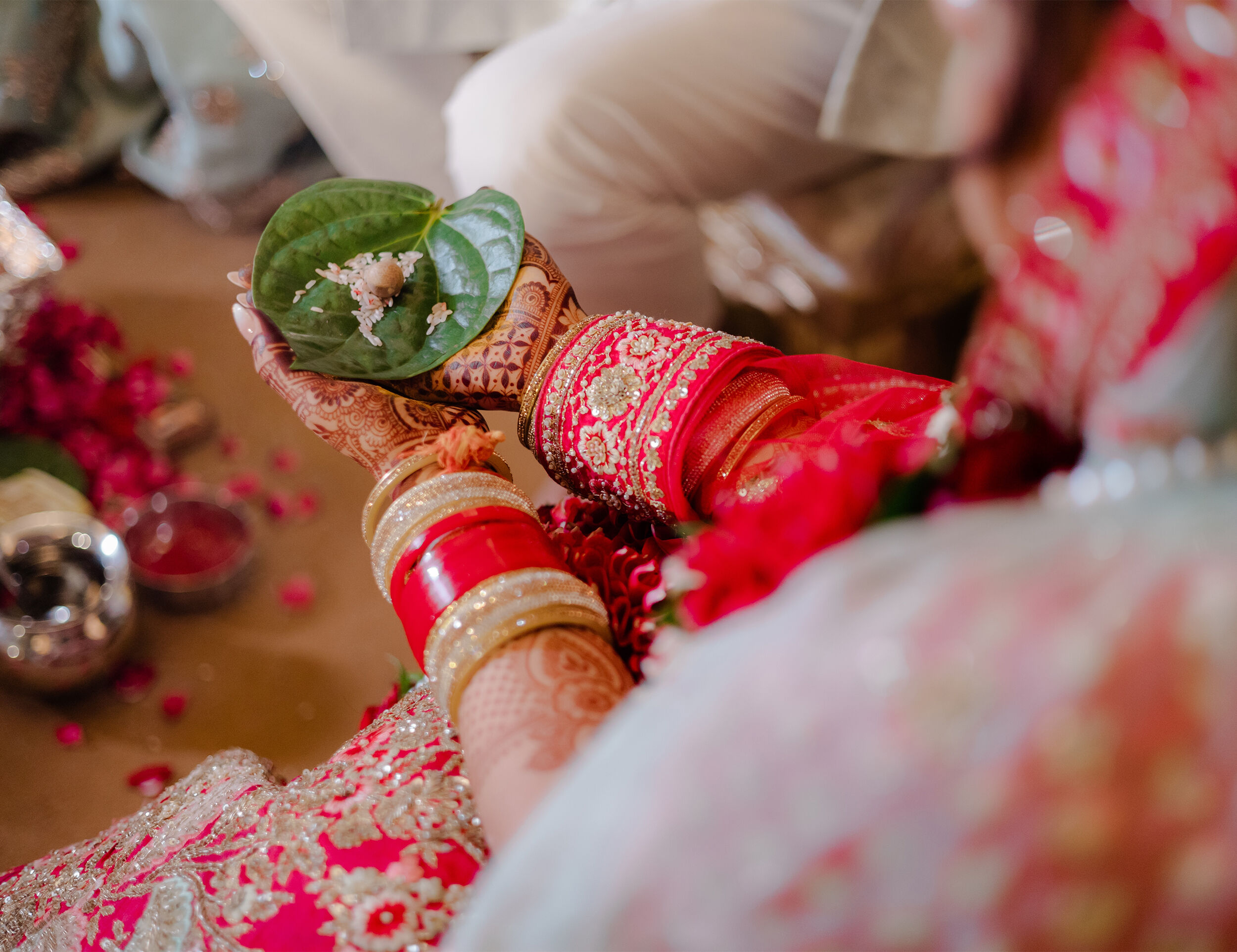 A bride doing wedding rituals on her weddding ceremony