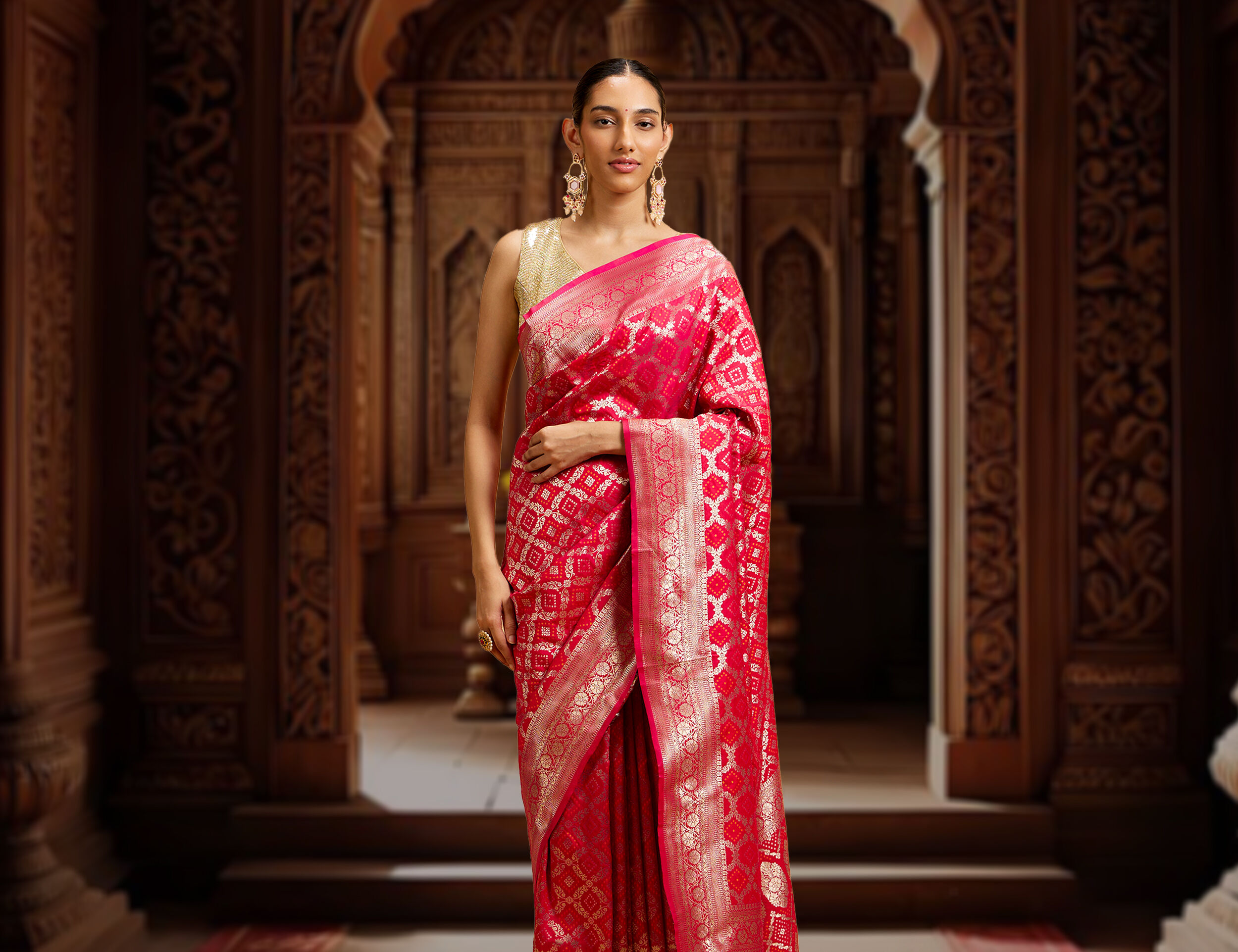 women in red saree for wedding reception