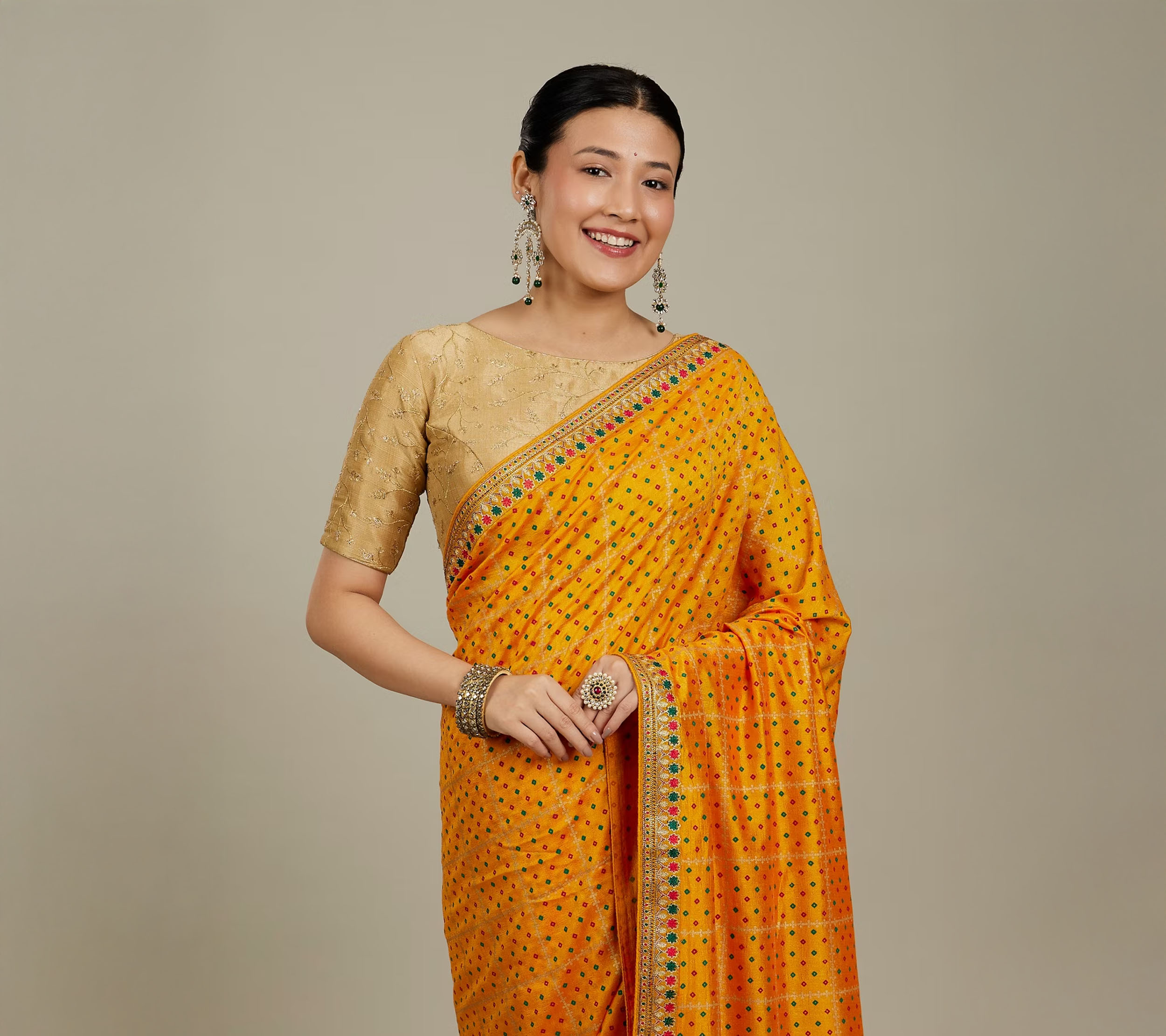 Mellow Yellow to Marigold: Rocking Festive Sarees in 2025's It Colour