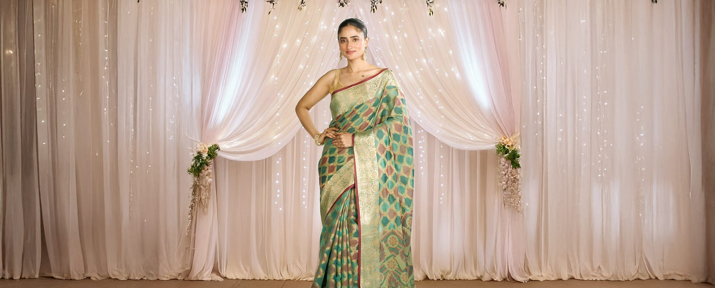 A woman in a beautiful green and gold Banarasi silk saree, celebrating Diwali.