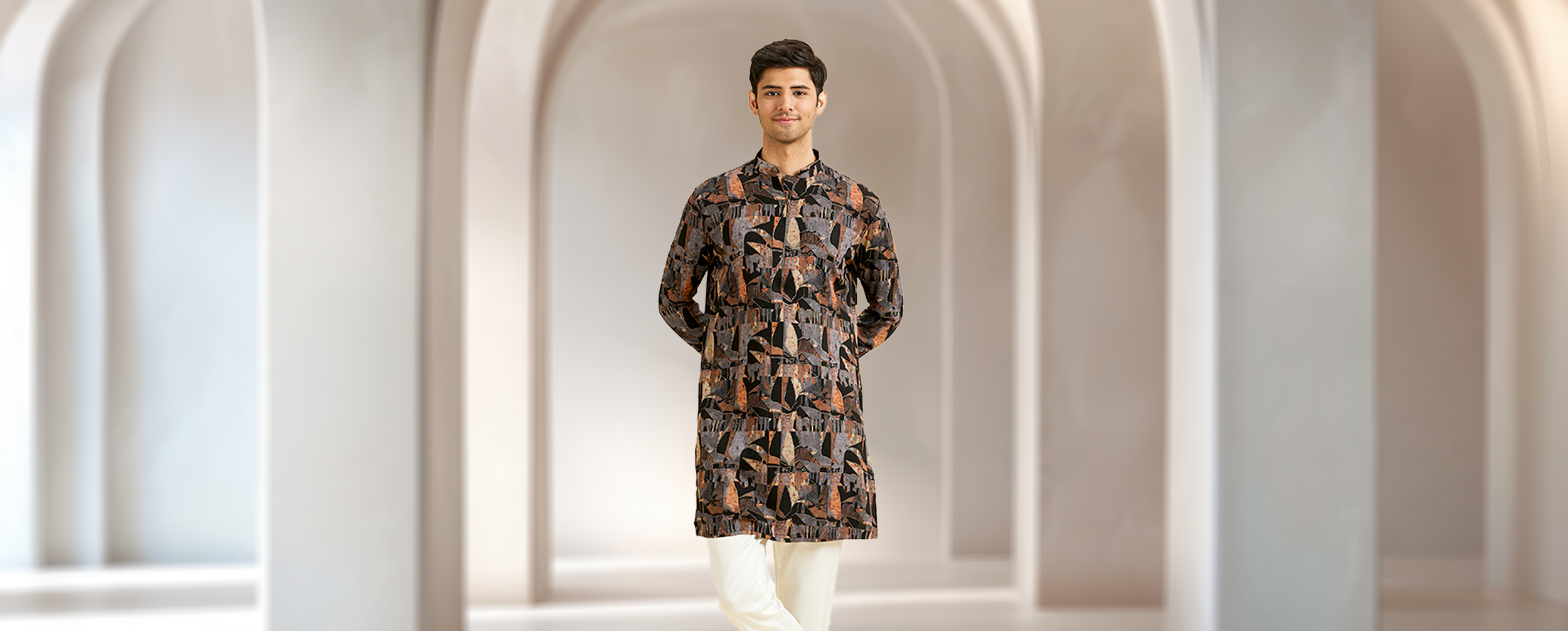 A groom in a stylish printed floral kurta and pajama set, perfect for a laid-back wedding vibe. A groom in a stylish printed floral kurta and pajama set, perfect for a laid-back wedding vibe.