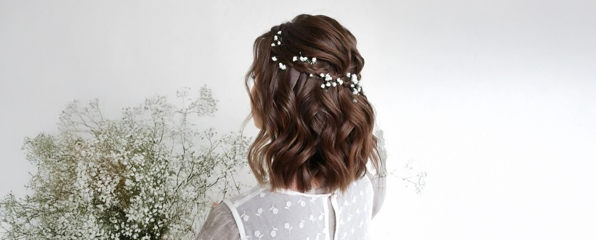 Short wedding hairstyle paired with elegant white dress for bridal ceremony Short wedding hairstyle paired with elegant white dress for bridal ceremony
