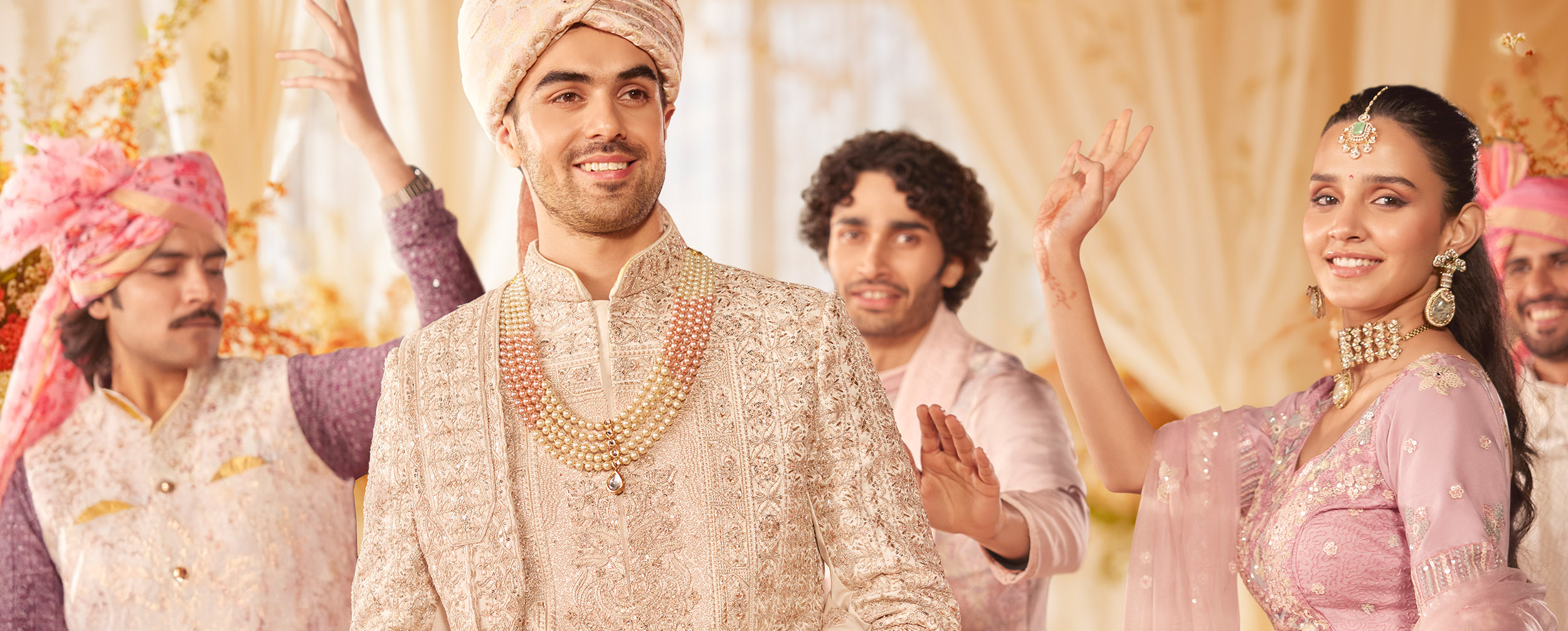 Groom wearing embroidered white kurta with elegant safa and dupatta Groom wearing embroidered white kurta with elegant safa and dupatta