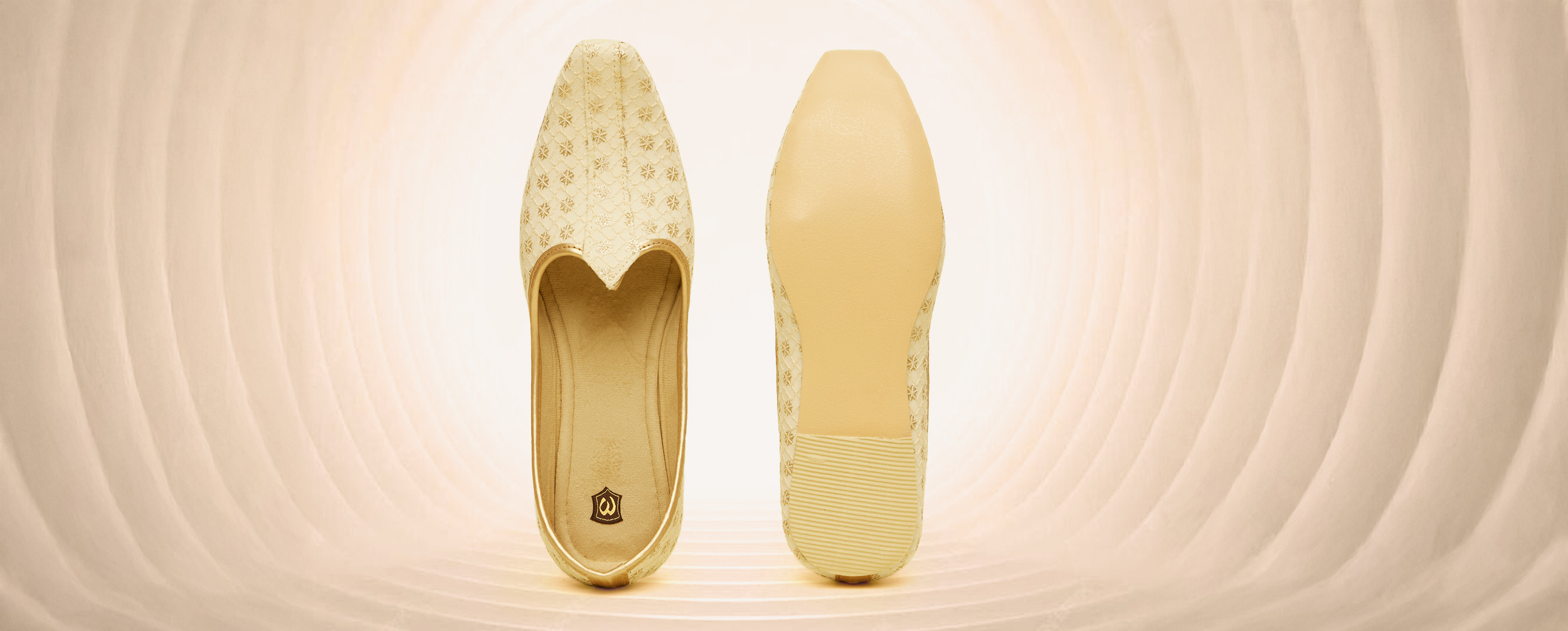 A pair of white brocade jutis for modern groom A pair of white brocade jutis for modern groom