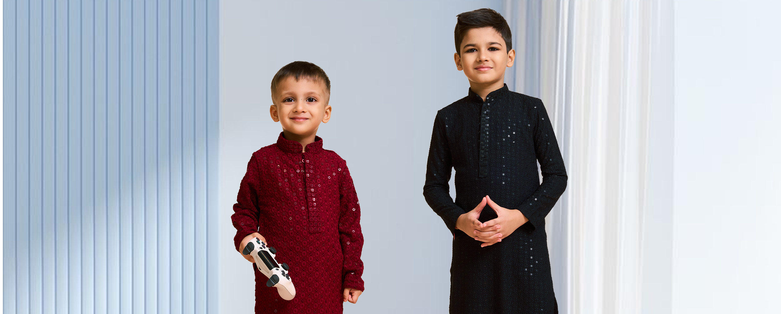 Boys wearing red and black chiknkari kurtas for function Boys wearing red and black chiknkari kurtas for function