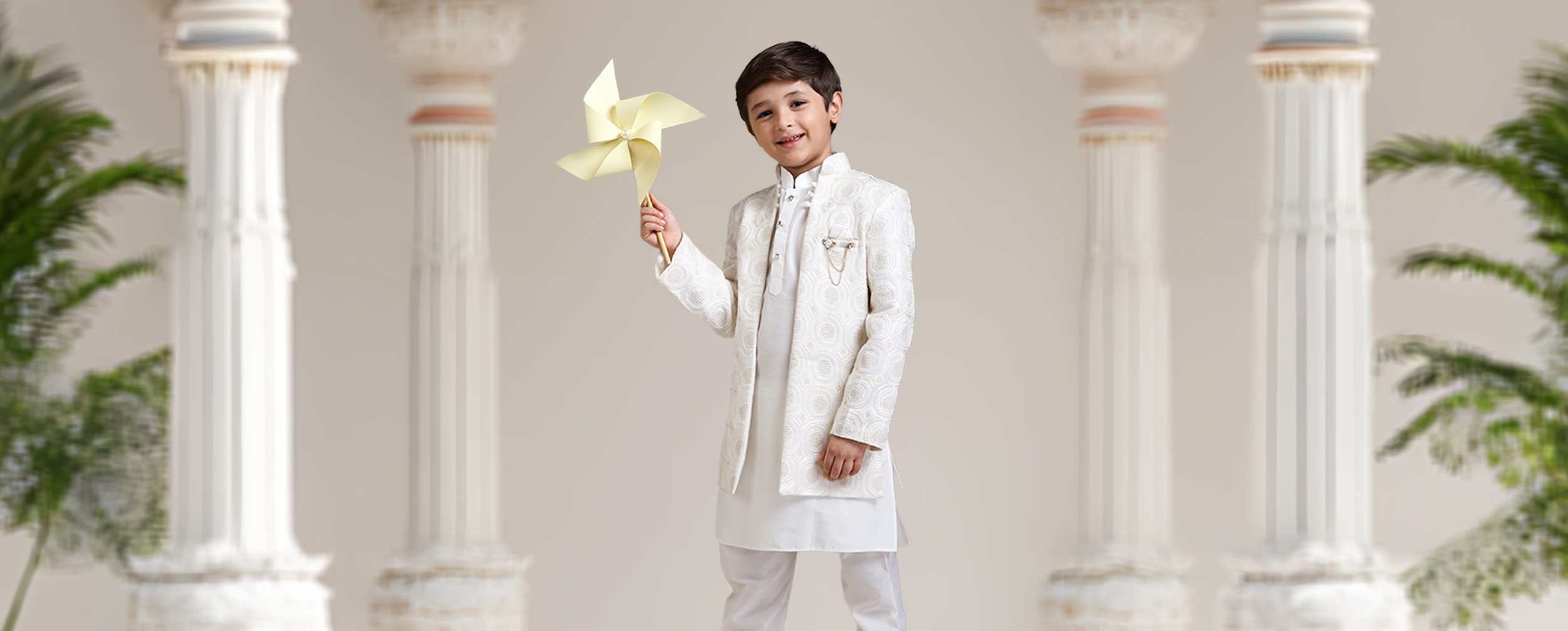 A boy in white indo western sherwani to shine in wedding A boy in white indo western sherwani to shine in wedding