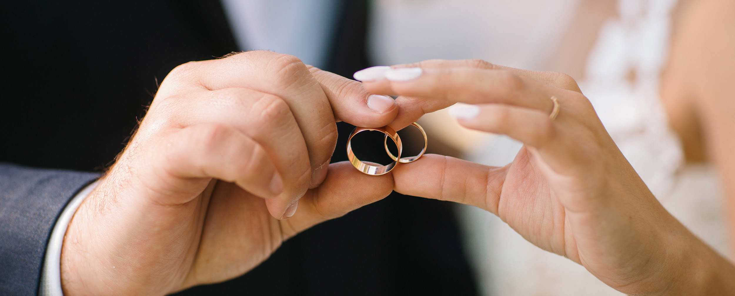 Couple showing there wedding ring Couple showing there wedding ring
