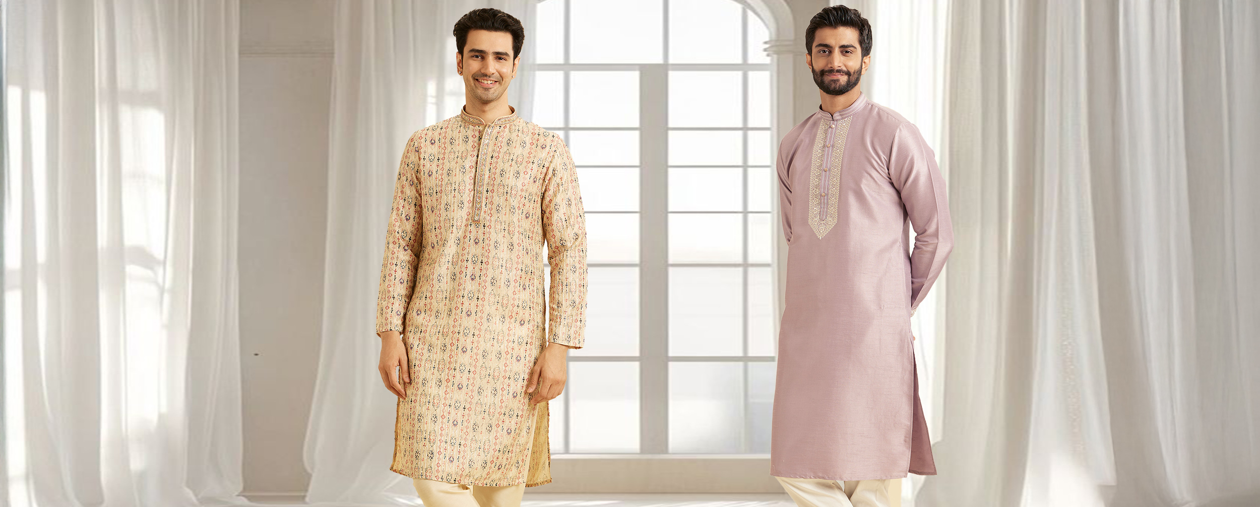  Two men standing side-by-side in patterned beige and embroidered lavender kurtas with churidars.