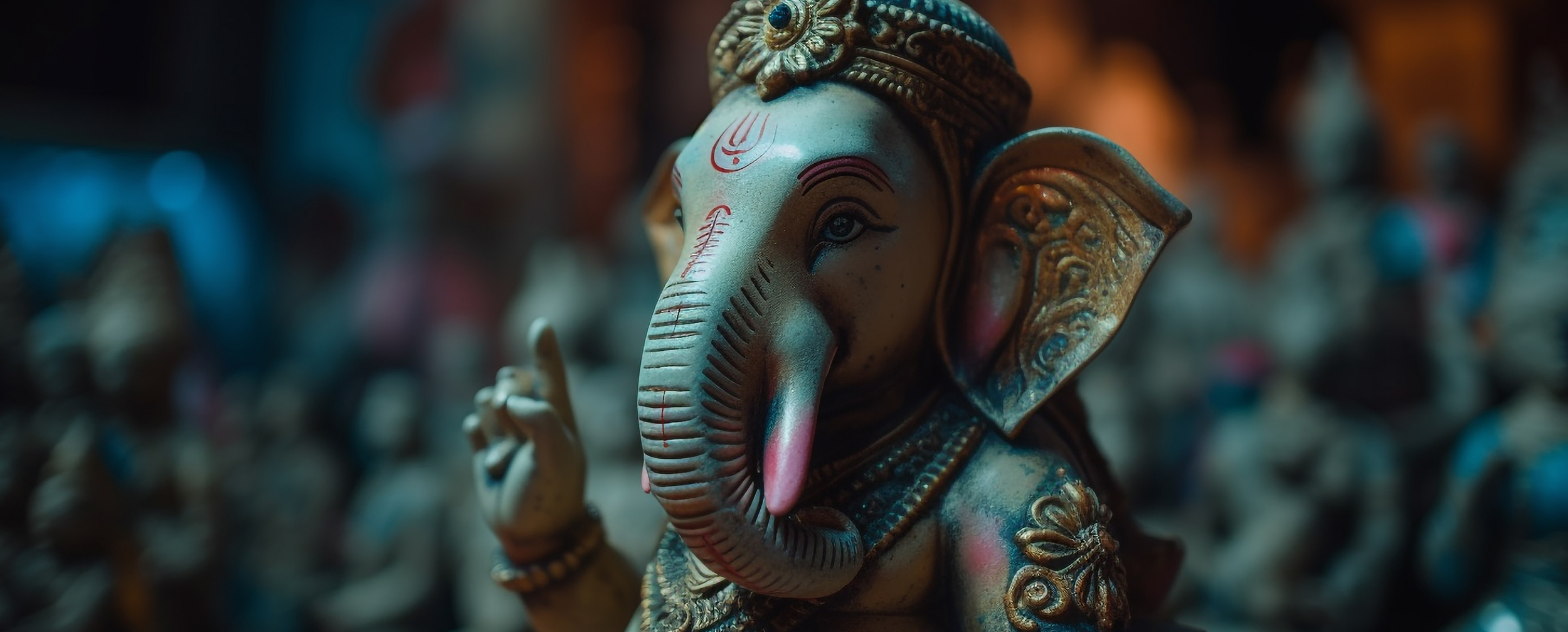 Close-up of a beautifully crafted Lord Ganesha idol with intricate detailing, symbolizing Ganesh Chaturthi celebrations and the story of his birth.