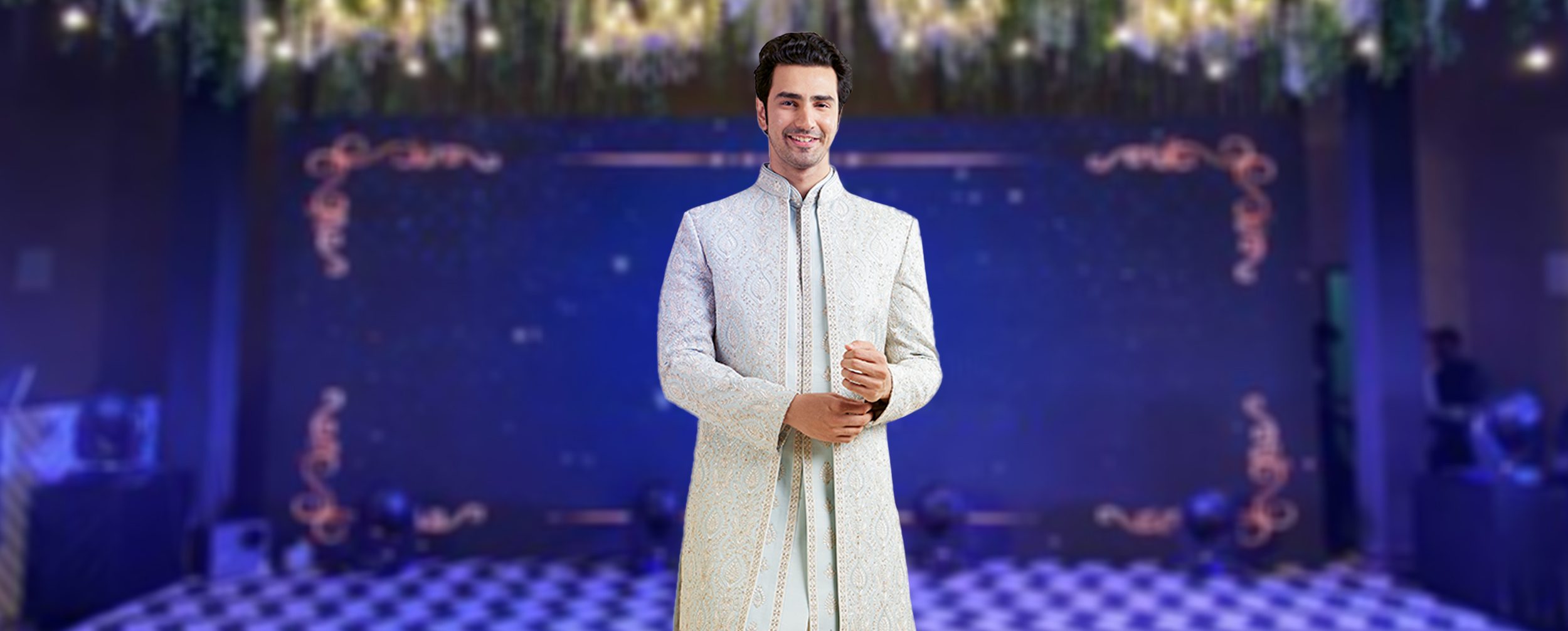 A man wearing blue sherwani for matching angeet theme A man wearing blue sherwani for matching angeet theme