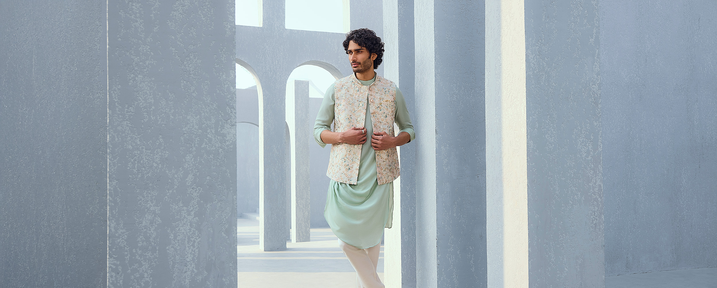 Man wearing a kurta pajama with jacket set