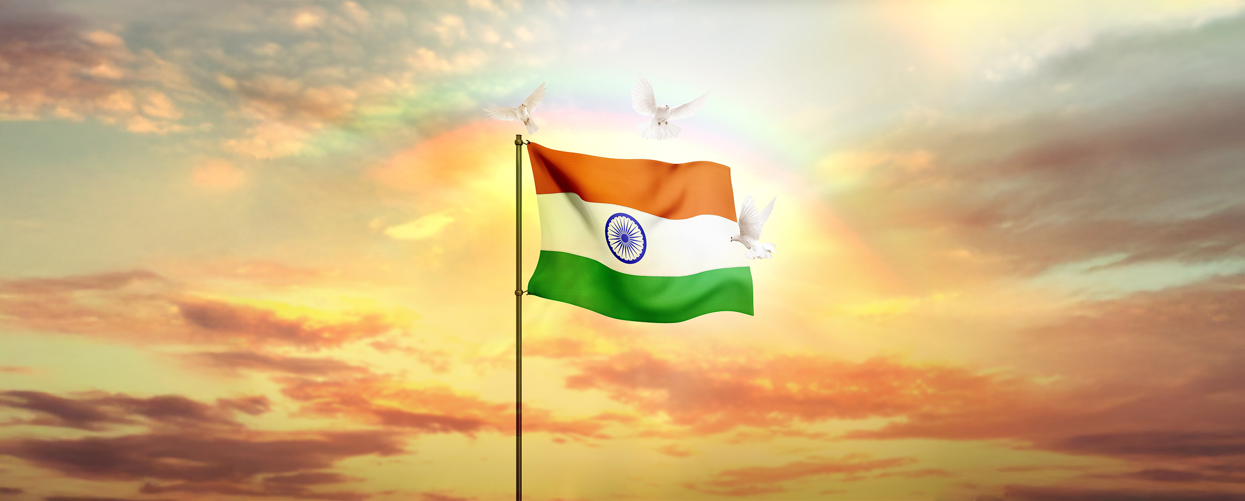 Indian national flag waving with three white doves and rainbow in the sky, symbolizing peace and freedom on Independence Day Indian national flag waving with three white doves and rainbow in the sky, symbolizing peace and freedom on Independence Day