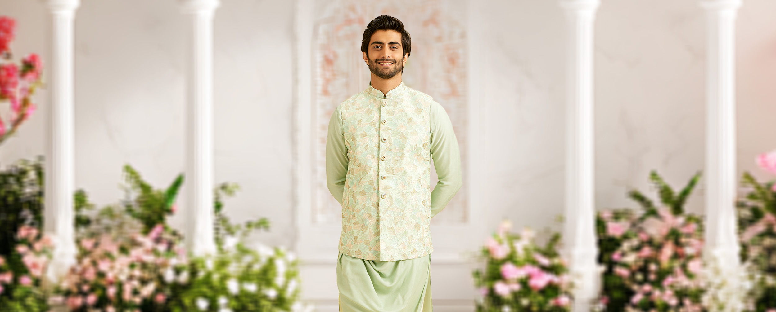 A groom wearing elegant light green kurta pajama with floral nehru jacket for destination wedding A groom wearing elegant light green kurta pajama with floral nehru jacket for destination wedding